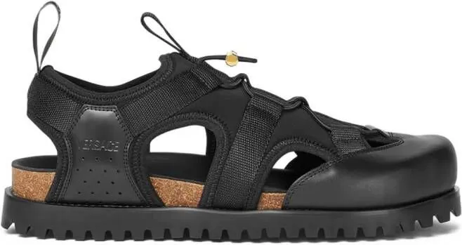 Versace logo-debossed caged sandals Black