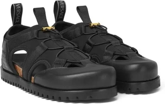 Versace logo-debossed caged sandals Black