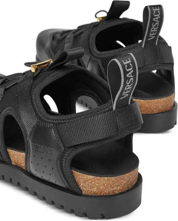 Versace logo-debossed caged sandals Black