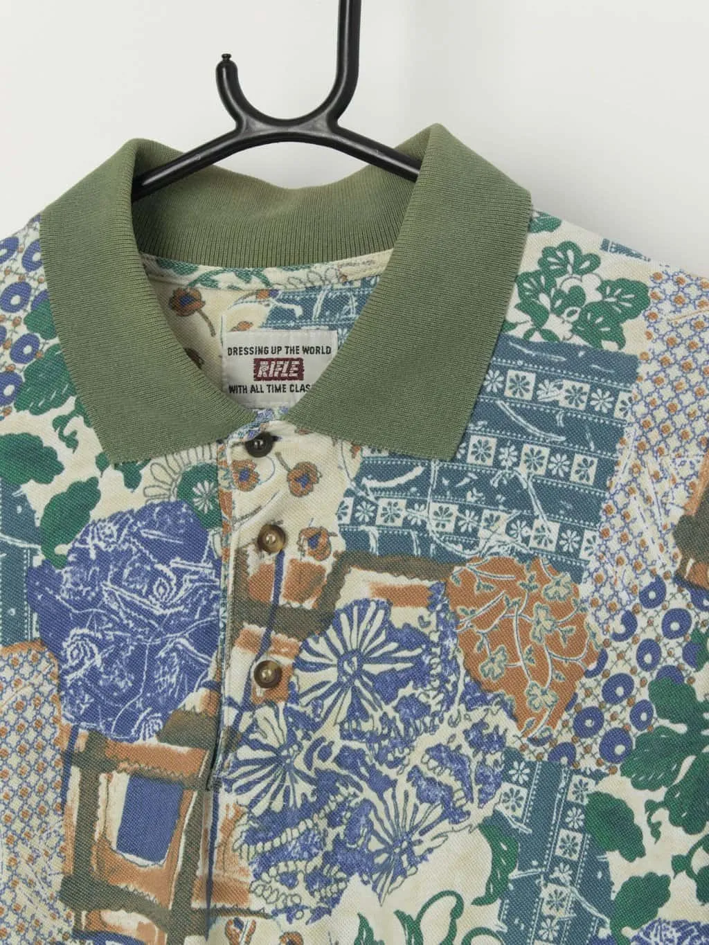 Vintage green polo shirt with funky design – Medium